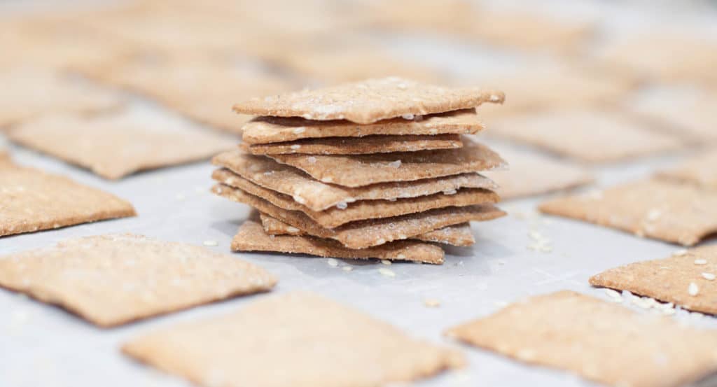 Have some sourdough starter you need to use but don't want to make bread? These Sourdough Sesame Rye Crackers are the perfect salty, crunchy, vegan friendly cracker! 