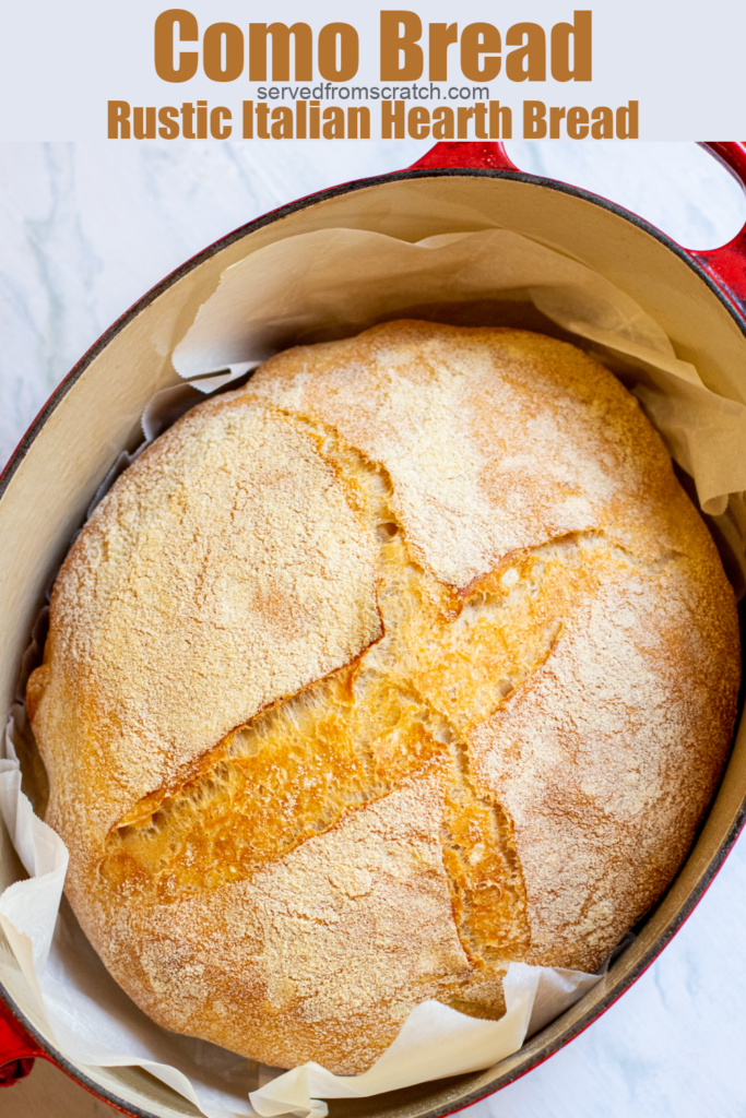 fresh baked bread in a dutch oven with Pinterest pin text.