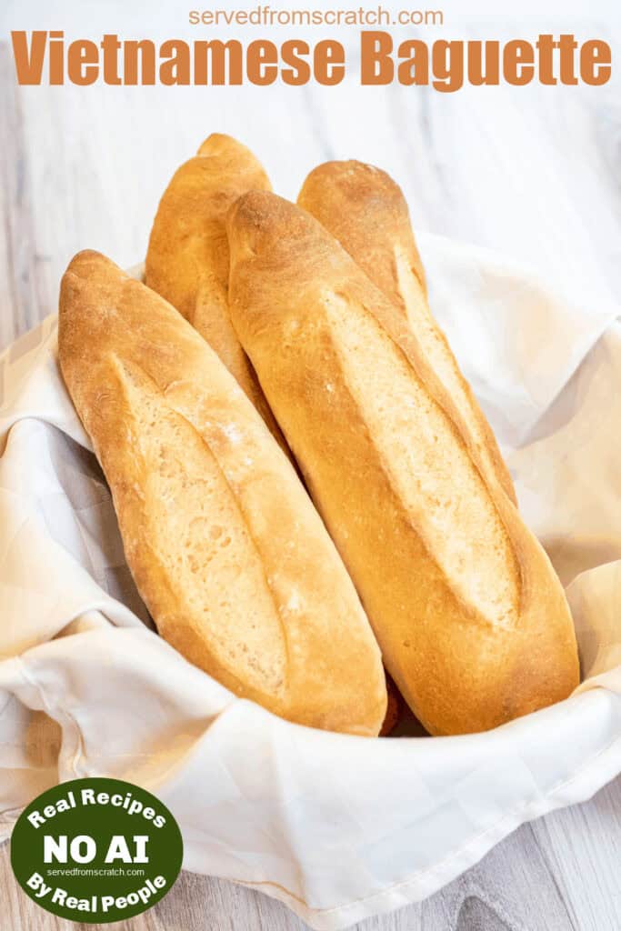 a bowl of fresh baked baguettes and Pinterest pin text and NO AI sticker.