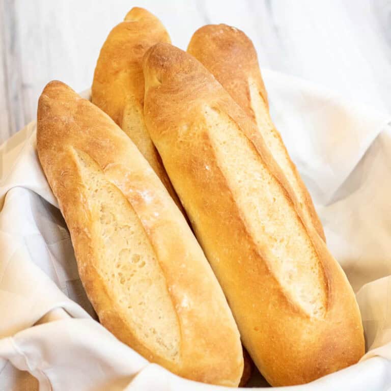 a bowl of fresh baked baguettes.