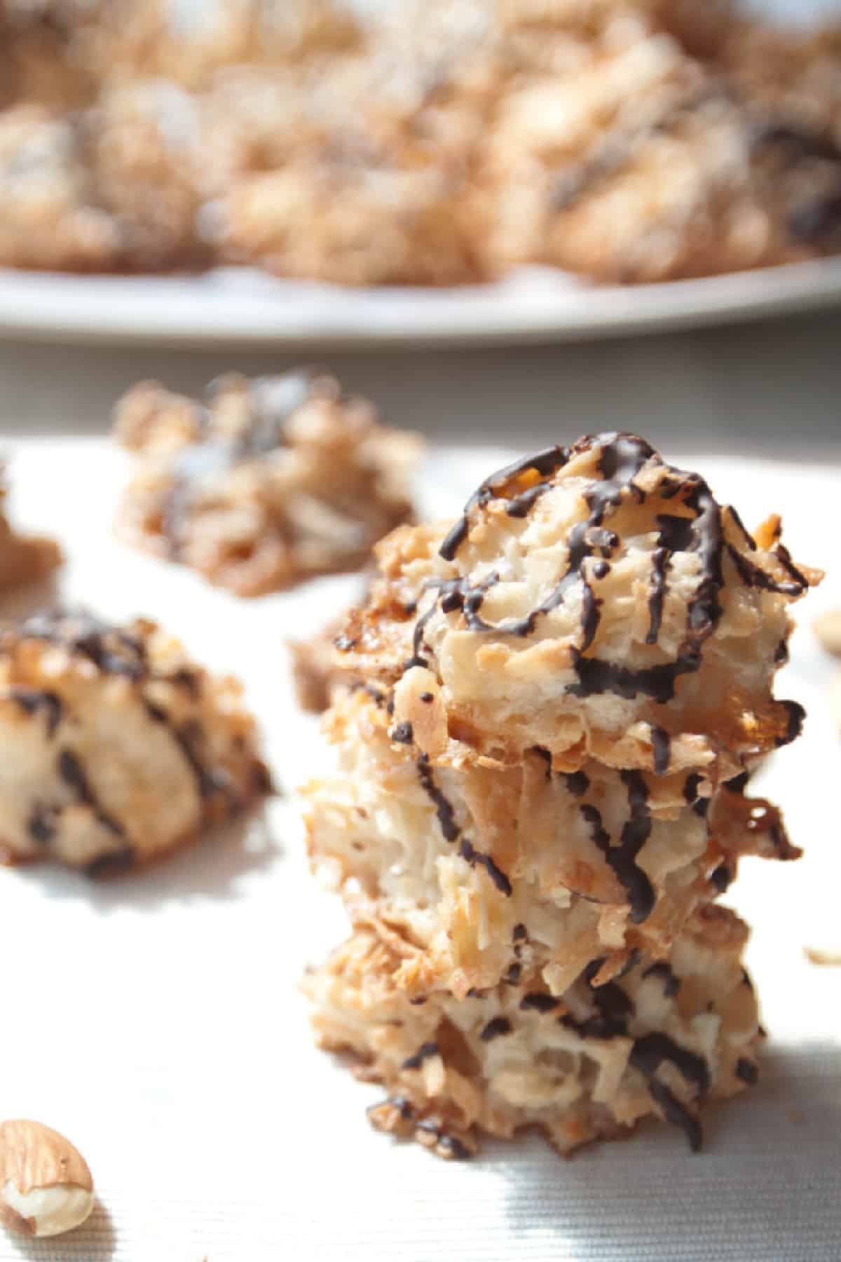 a stack of chocolate covered macaroons.