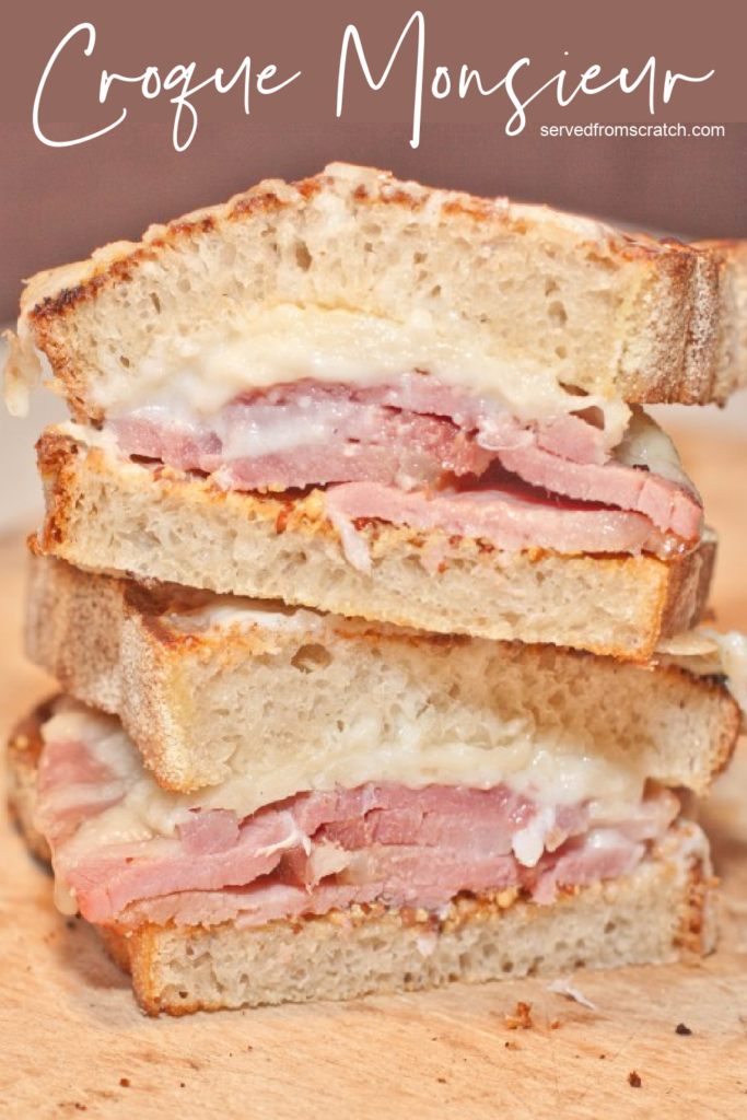 stacked ham and cheese sandwich sliced in half with Pinterest pin text.