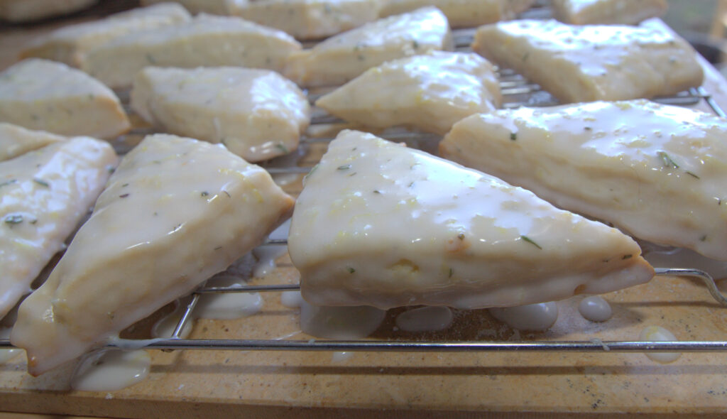 glazed scones on a cooling rack.
