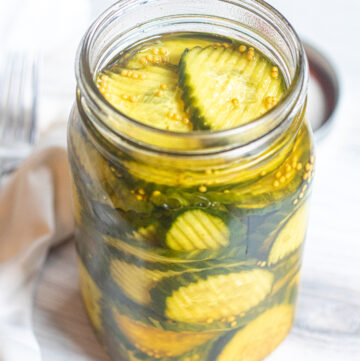 a large open jar of pickles.