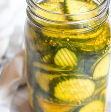 a large open jar of pickles.