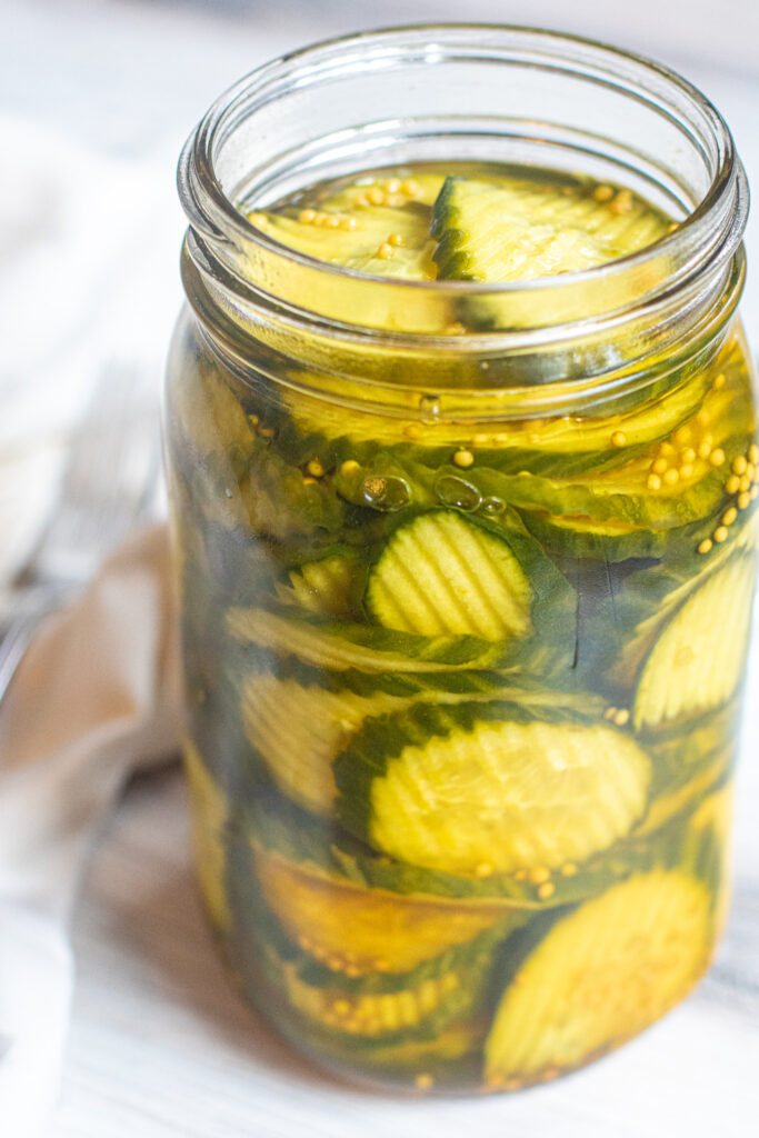 a large open jar of pickles.