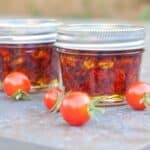 small mason jars of sundried cherry tomatoes.