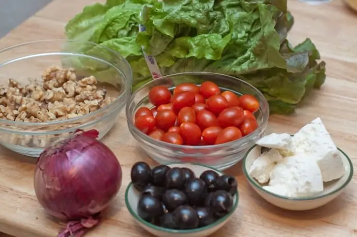 romaine lettuce, onion, tomatoes, olives, walnuts, feta.