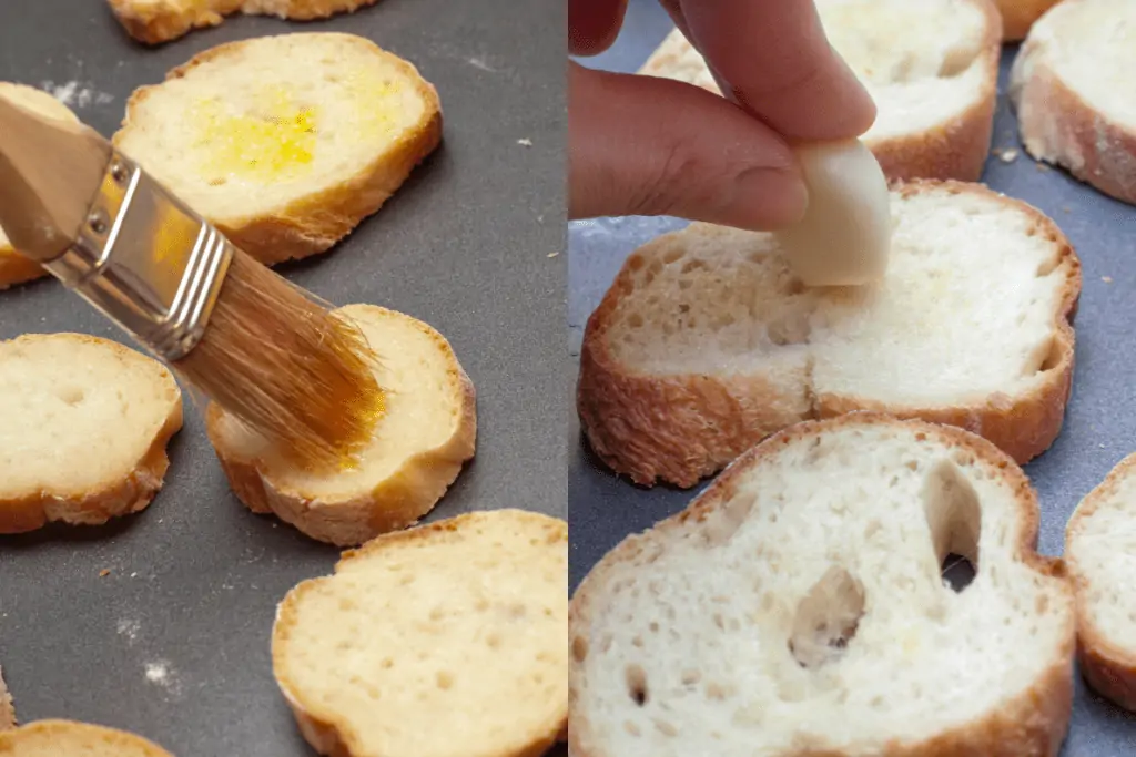 garlic being rubbed on a crostini and brushed with oil.