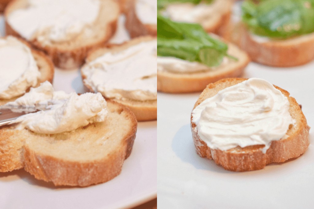 a crostini with cheese being added on a crostini.