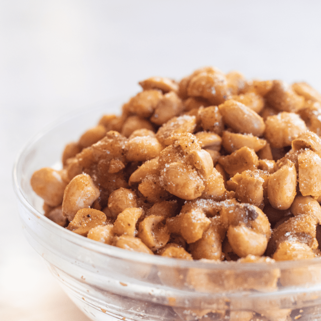 a bowl of honey roasted peanuts.