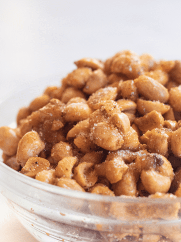 a bowl of honey roasted peanuts.