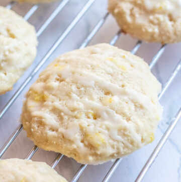 baked glazed cookies on a cooking rack.