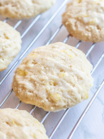 baked glazed cookies on a cooking rack.