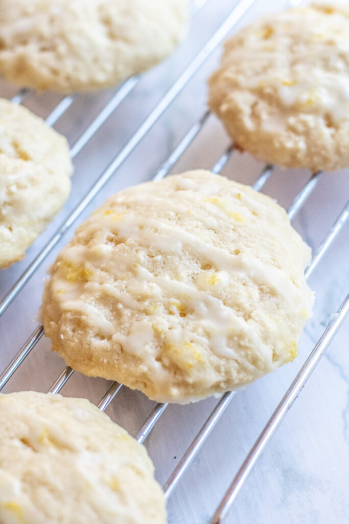 baked glazed cookies on a cooking rack.