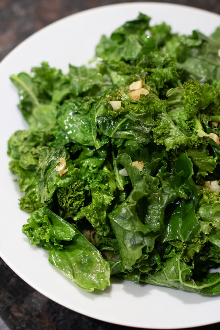 cooked garlic kale in a bowl.