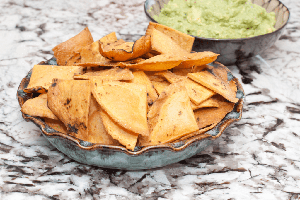 a bowl of fresh made corn tortilla chips.