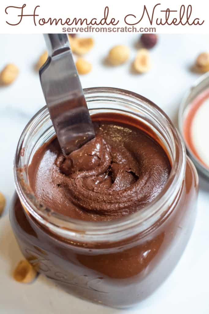 a jar of creamy nutella with a knife in it and Pinterest pin text.