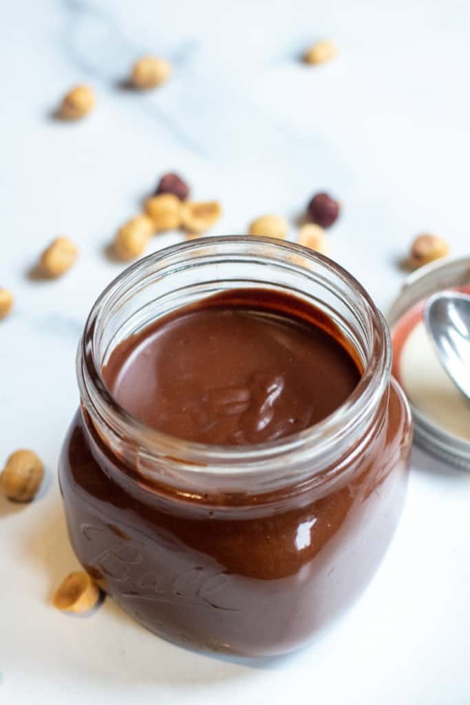 an open jar of nutella.