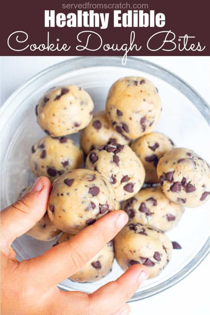 a bowl of cookie dough balls with a hand grabbing one with Pinterest pin text.