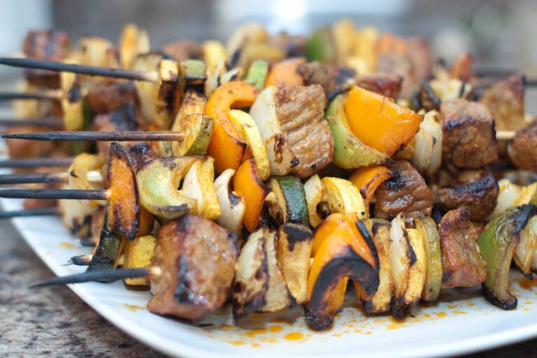 grilled spicy beef kabobs cooked and on a plate