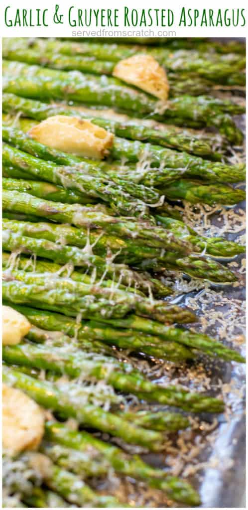 a pan of cooked asparagus with garlic and melted cheese with Pinterest pin text.