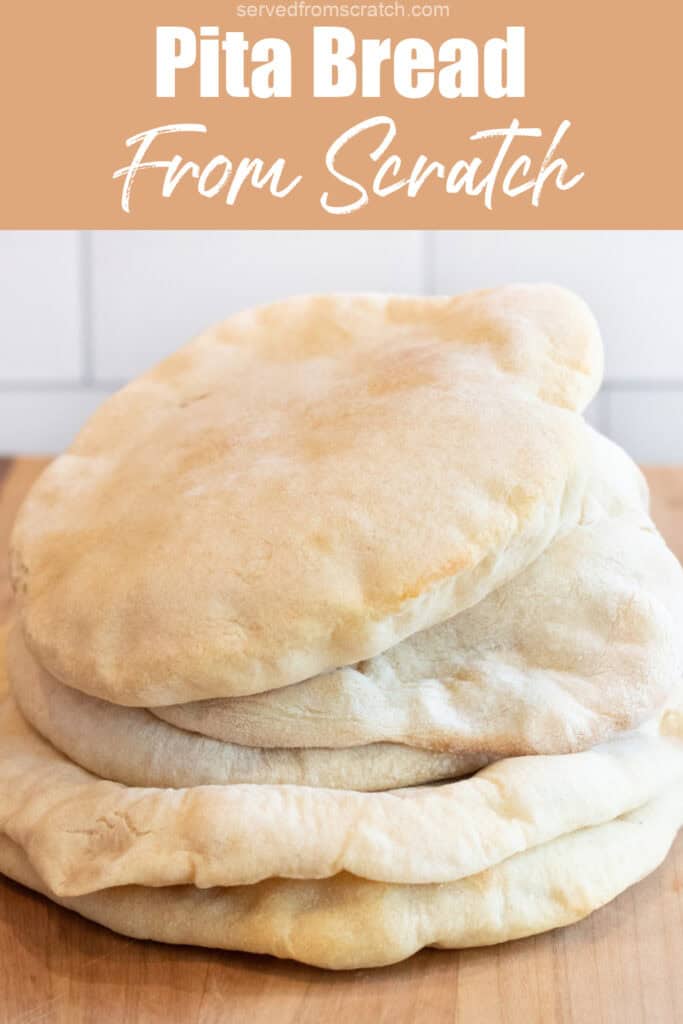 stacked uncut pita breads on a cutting board with Pinterest pin text.