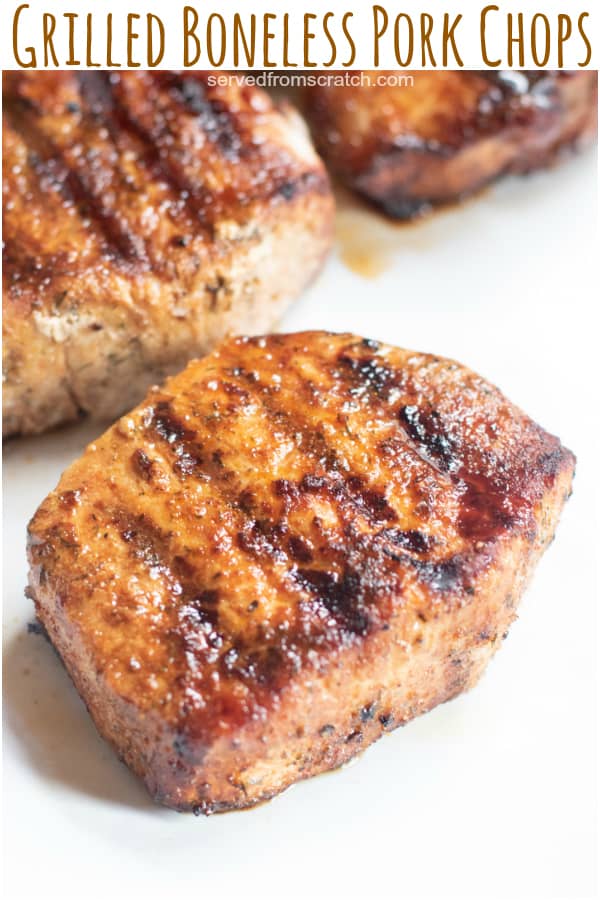 a grilled boneless pork chop with Pinterest pin text.