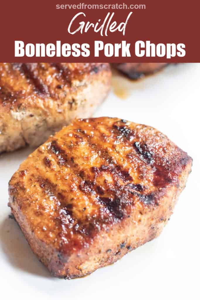 a thick grilled boneless pork chop with Pinterest pin text.
