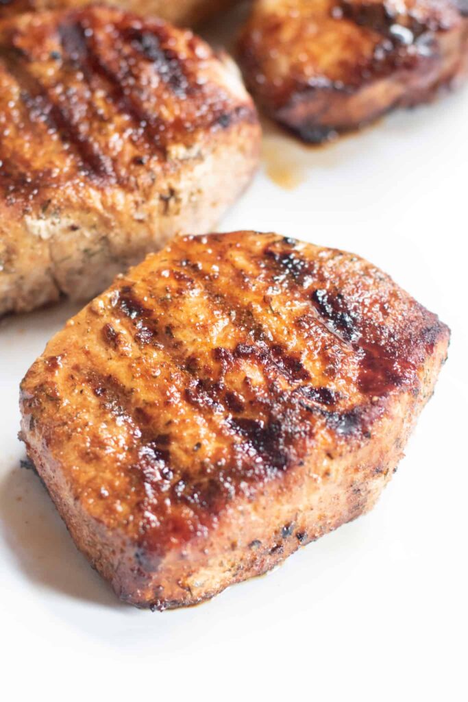 juicy grilled boneless pork chops with grill marks