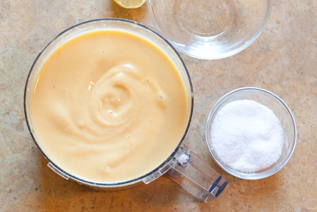 a food processor blended with peaches