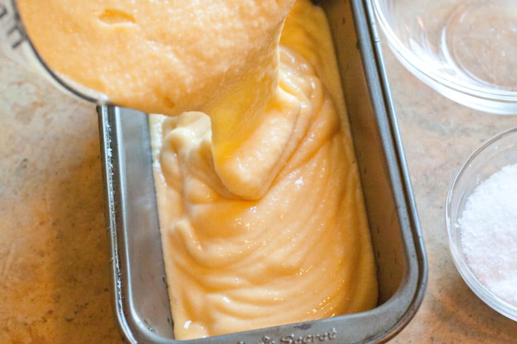 peach puree poured into a loaf pan