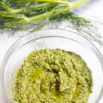 a bowl of pesto and fennel fronds.