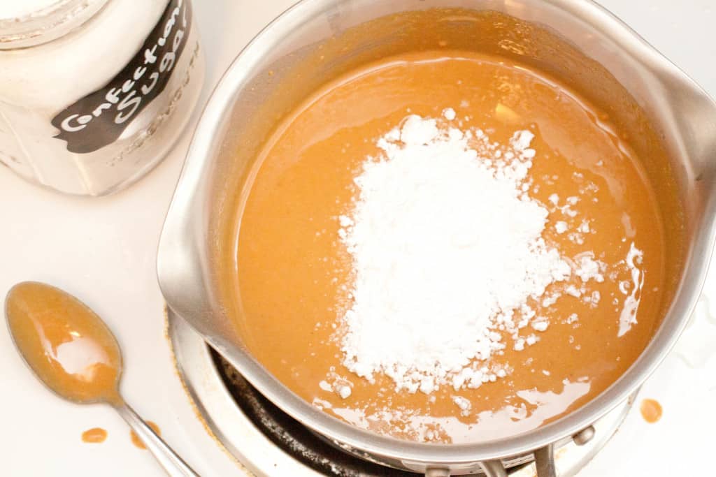 sauce pan with peanut butter and sugar 