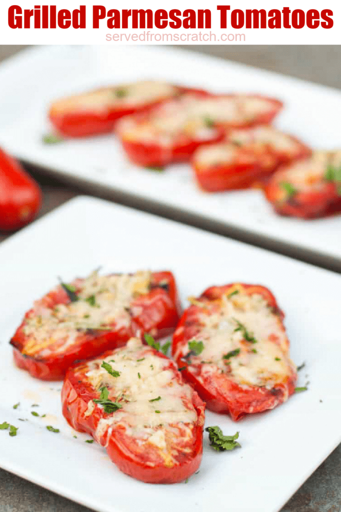 a plate of halved tomatoes with melted cheese on a plate with Pinterest pin text.