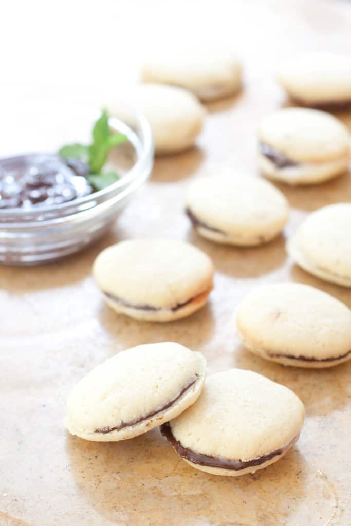 homemade milano cookies lined up on board