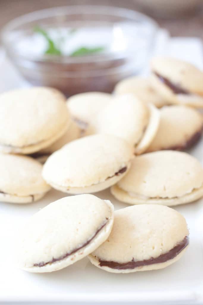 a plate of sandwich cookies 