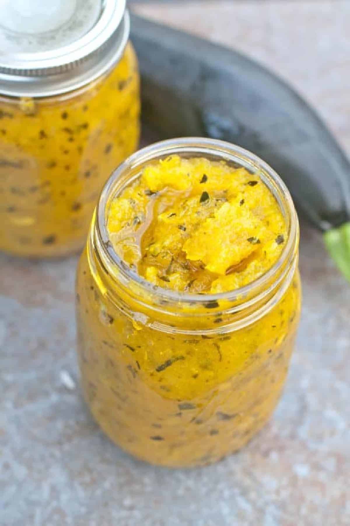 an open jar of zucchini relish.