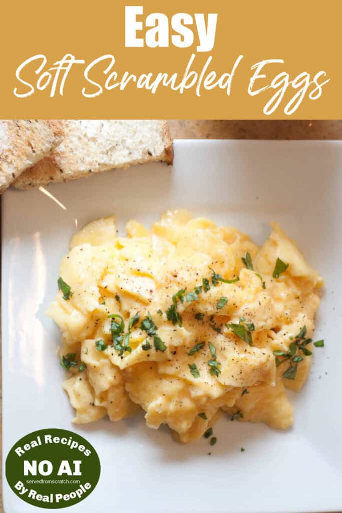 an overhead of a plate of soft scrambled eggs with basil with Pinterest pin text and NO AI sticker.
