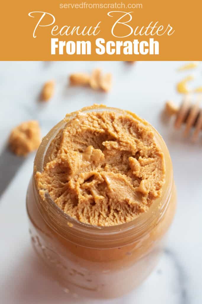 an overhead of an open jar of peanut butter with a knife next to it with Pinterest pin text.