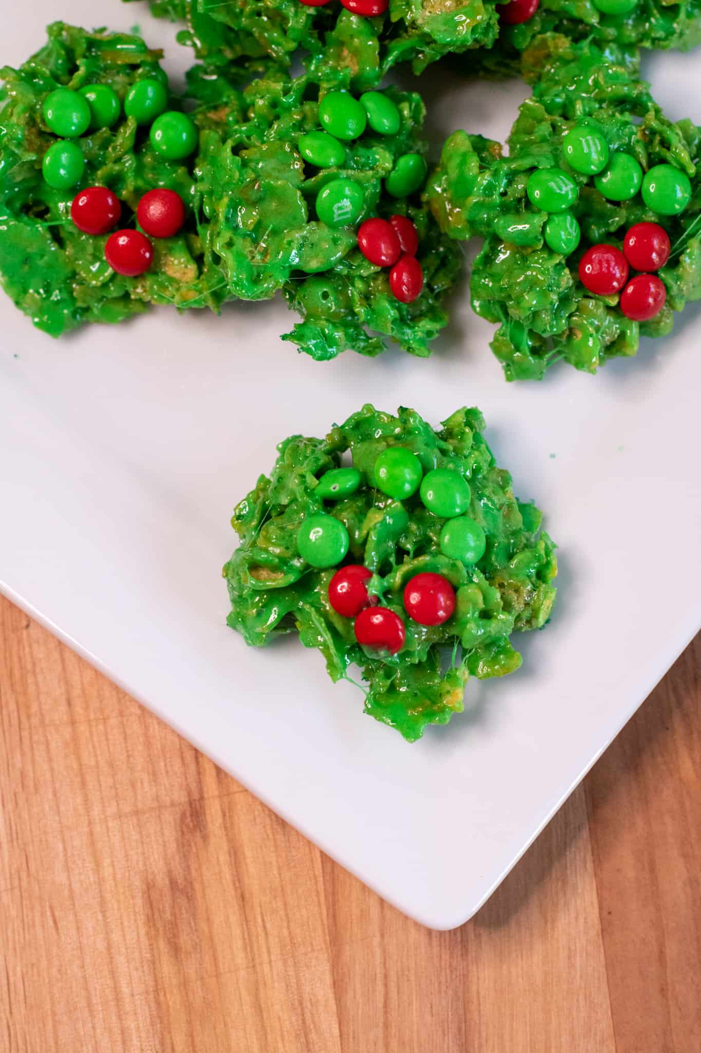 a plate of Christmas wreath cookies.