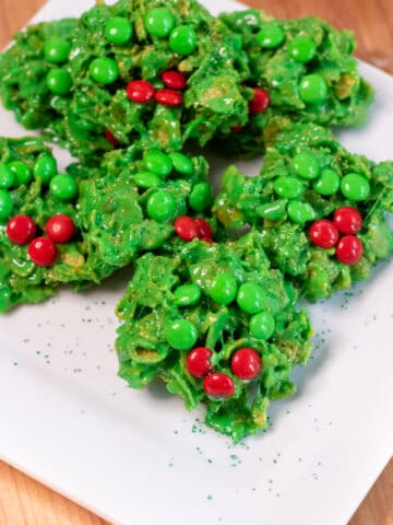 a plate of Christmas wreath cookies.