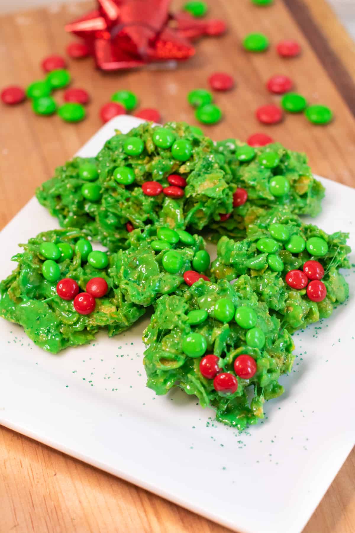 a plate of Christmas wreath cookies.