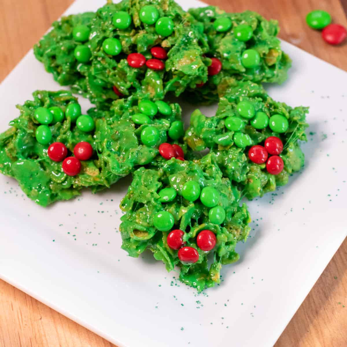a plate of Christmas wreath cookies.