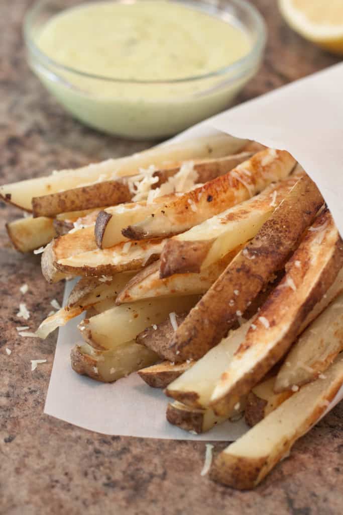 steak fries with cheese and an aioli.