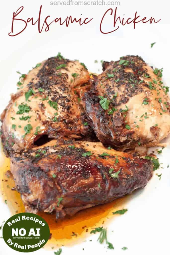 cooked chicken breasts with herbs and balsamic on plate with Pinterest Pin Text and a NO AI sticker.