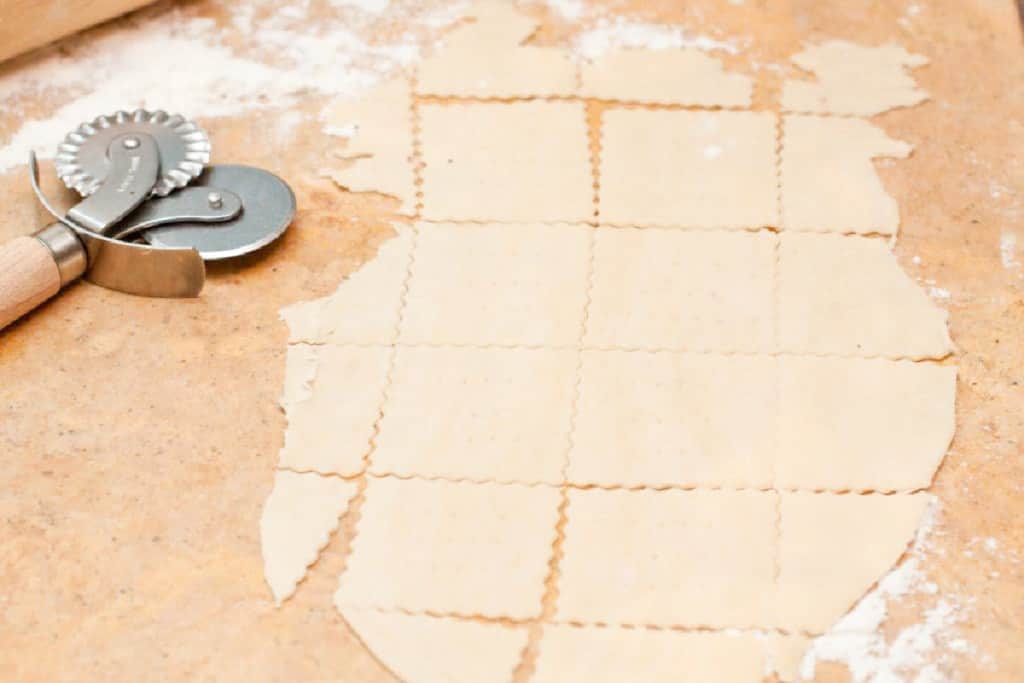 dough rolled out and cut with a wheel cutter.