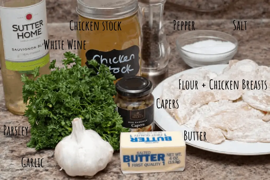 floured chicken, chicken stock, salt, pepper, capers, fresh parsley, garlic, butter, and white wine on counter