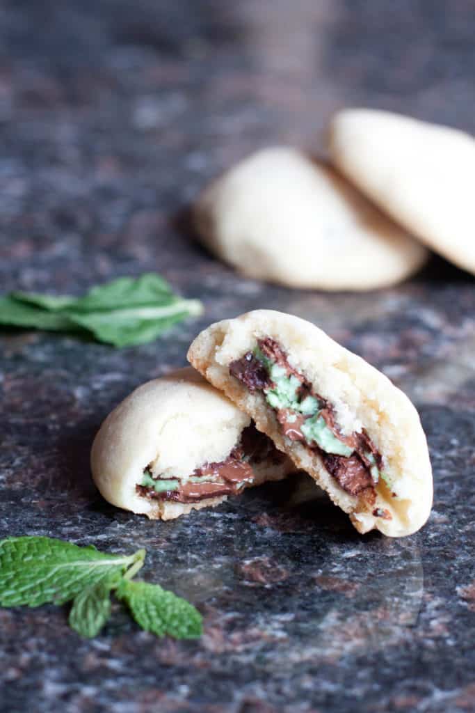 sugar cookies with andes mint inside and half a cookie open