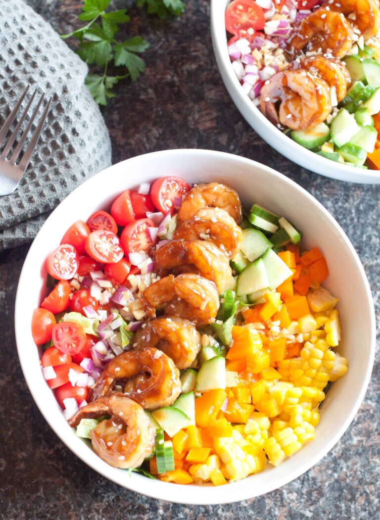 bowl with shrimp and colorful chopped vegetables